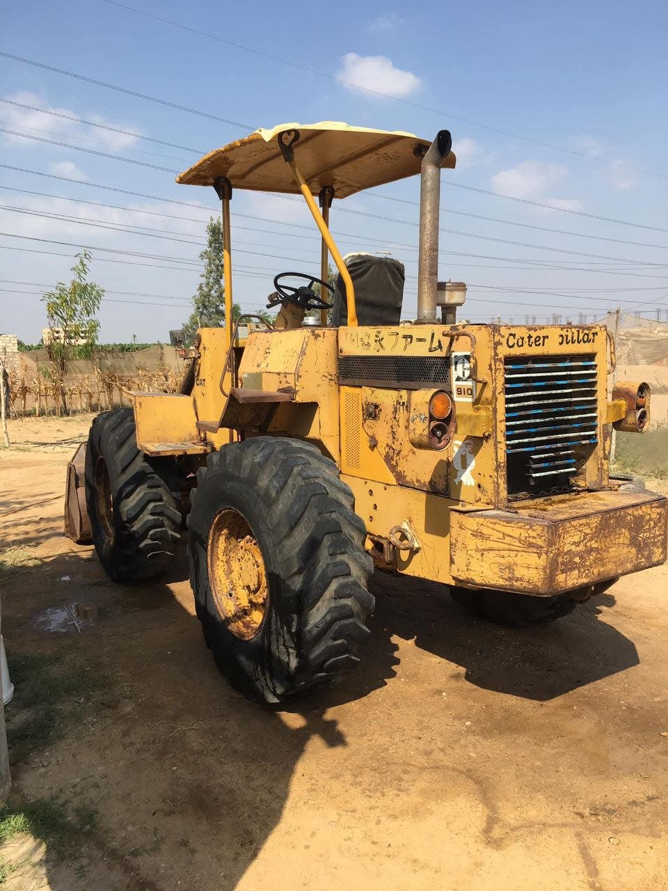 Caterpillar loader for sale in Egypt, Caterpillar 910 model 1998 located in Cairo, the best site for selling heavy equipment in Egypt.