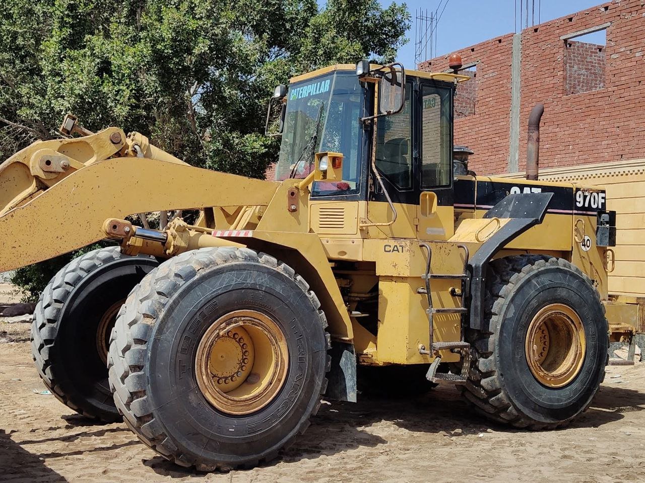 Caterpillar loader for sale in Egypt, Caterpillar 70F model 1999 located in Cairo, the best site for selling heavy equipment in Egypt.