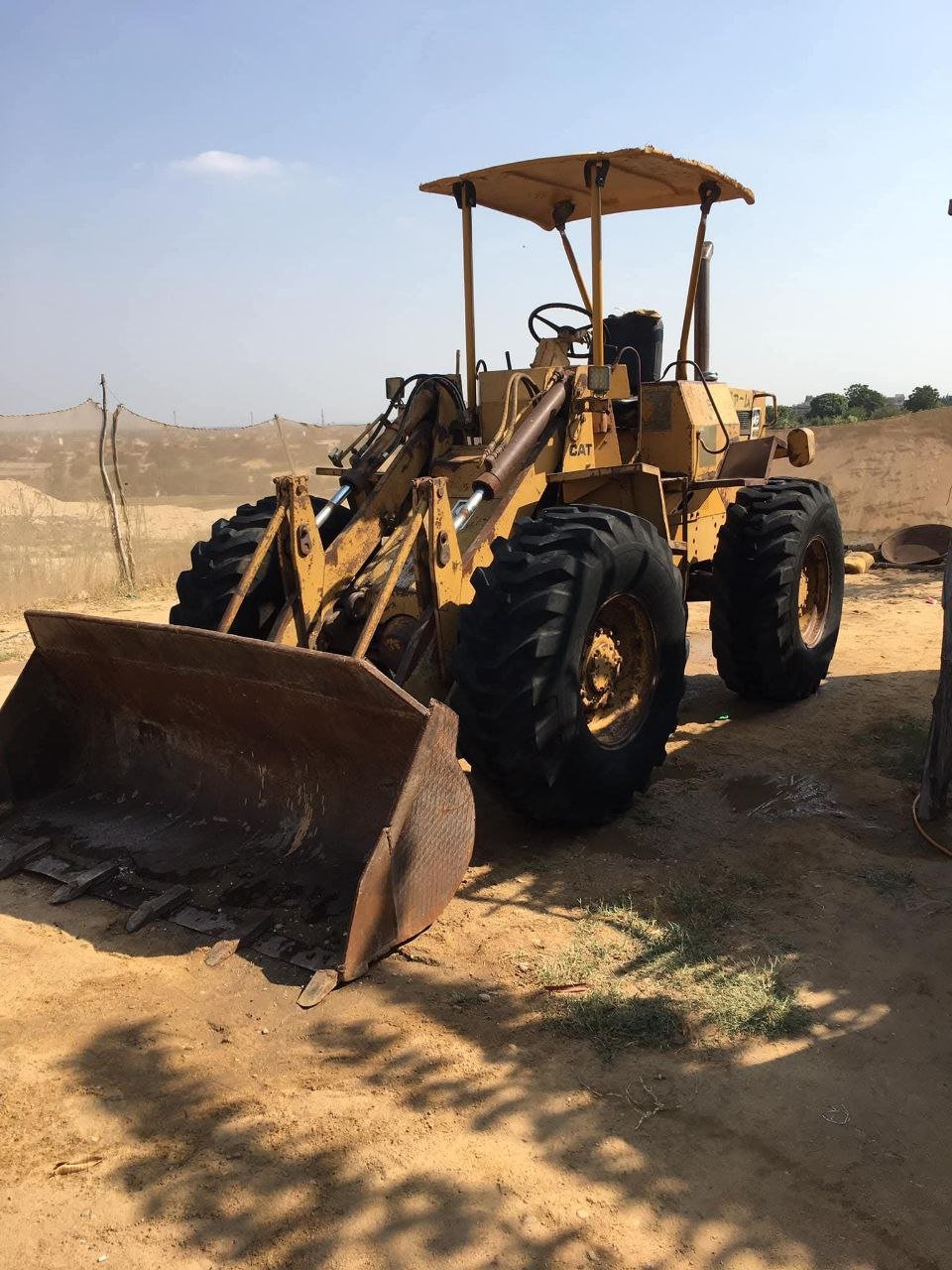 Caterpillar loader for sale in Egypt, Caterpillar 910 model 1989, located in Cairo, the best site for selling heavy equipment in Egypt