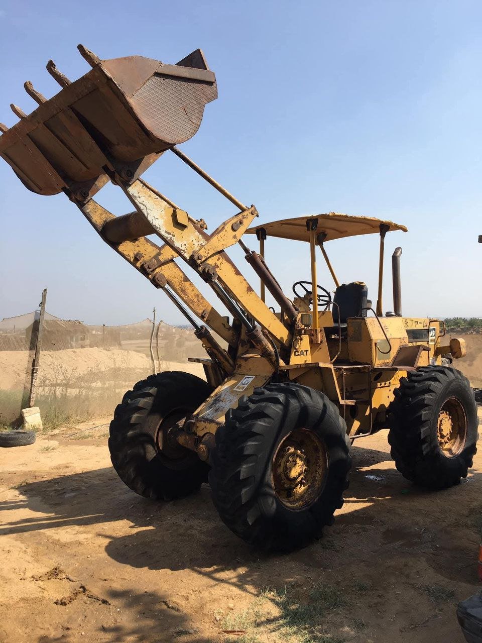 Caterpillar loader for sale in Egypt, Caterpillar 910 model 1989, located in Cairo, the best site for selling heavy equipment in Egypt