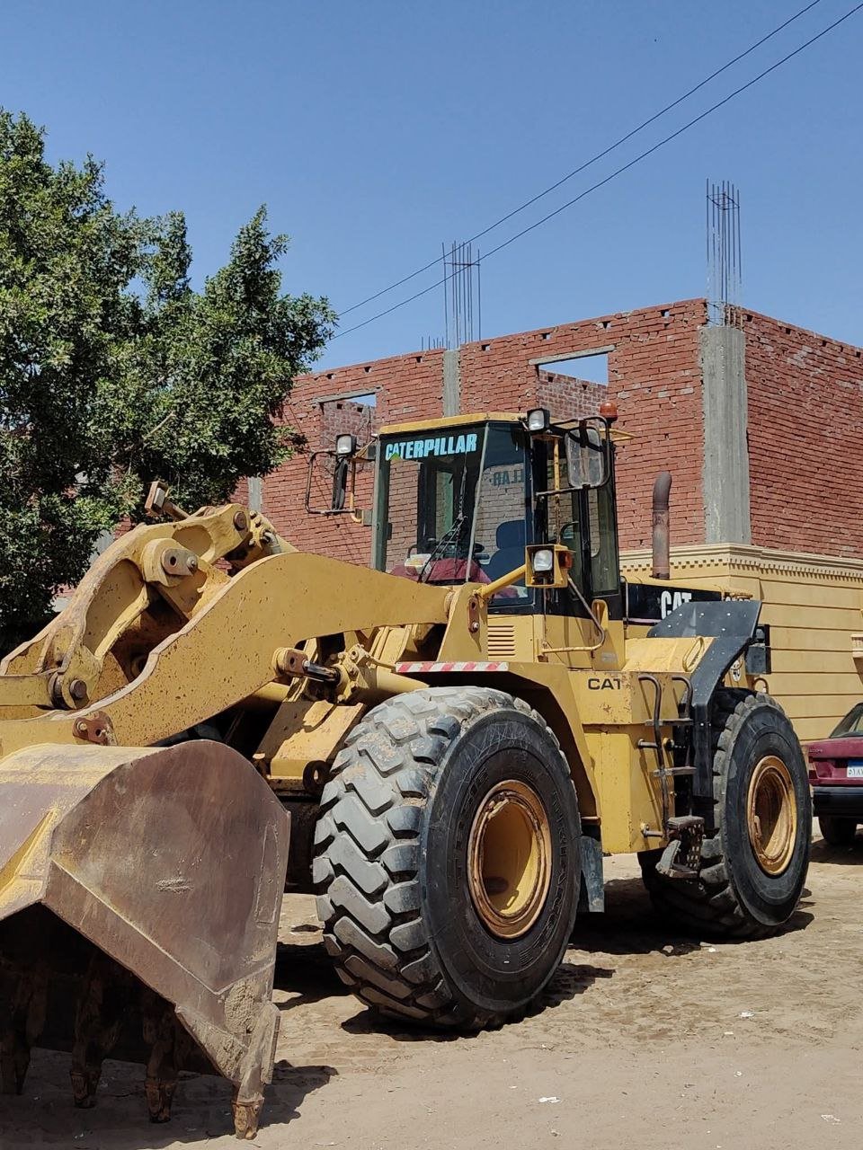 Caterpillar loader for sale in Egypt, Caterpillar 70F model 1999 located in Cairo, the best site for selling heavy equipment in Egypt
