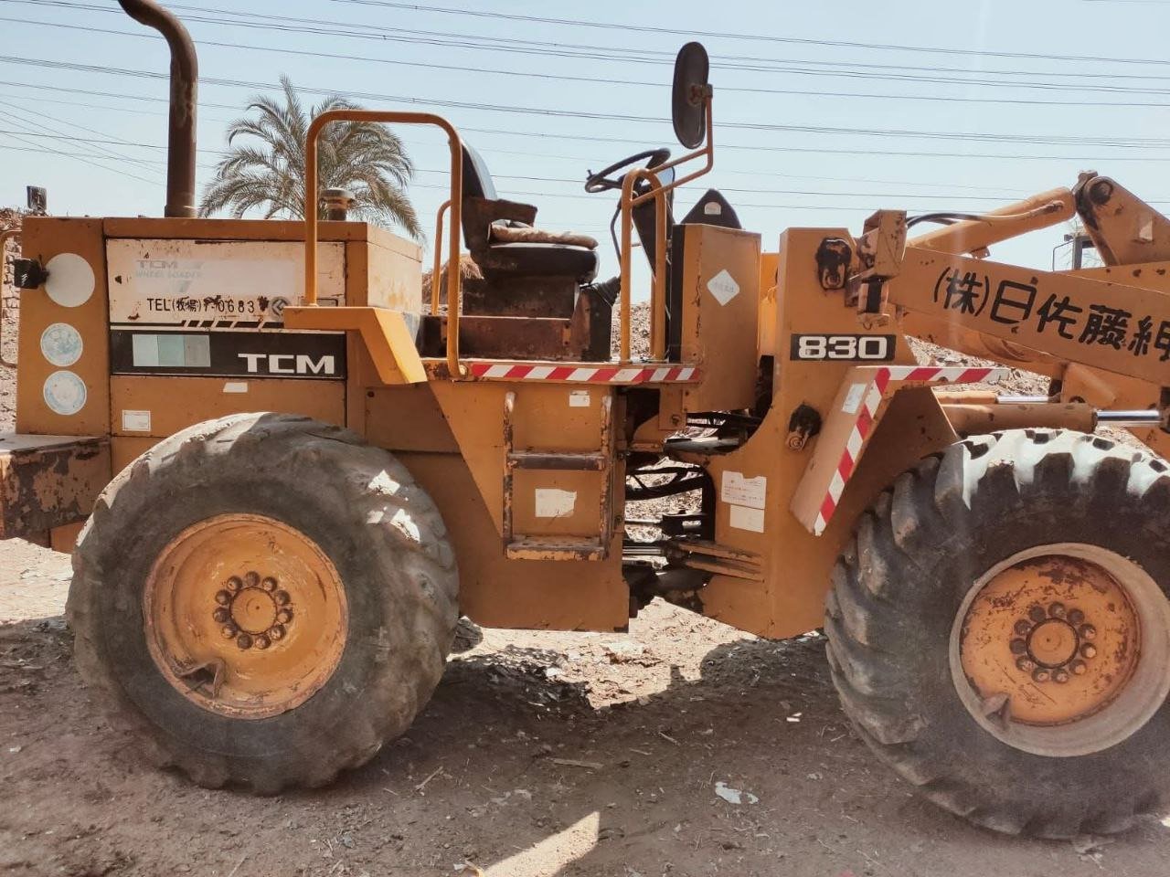 TCM loader for sale in Egypt, TCM 830 model 2001 located in Cairo, the best site for selling heavy equipment in Egypt