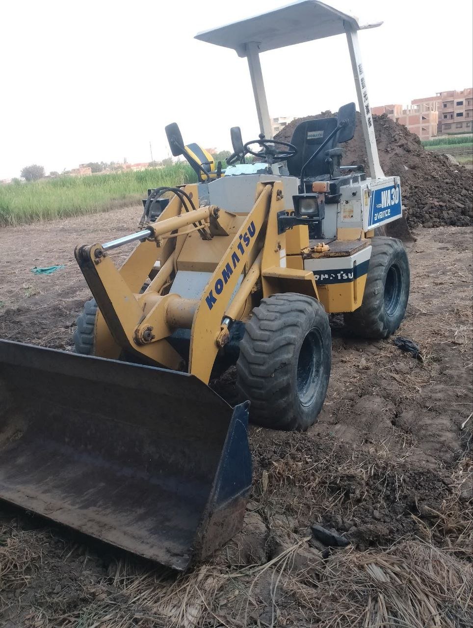 Komatsu loader for sale in Egypt, Komatsu 30 model 1980 located in Giza, the best site for selling heavy equipment in Egypt