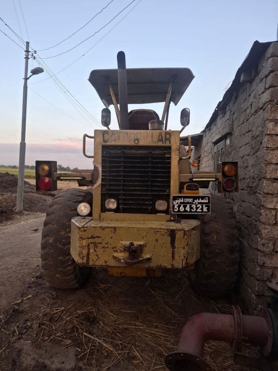 Caterpillar loader for sale in Egypt, Caterpillar 910 model 1990 located in Mansoura, the best site for selling trucks and heavy equipment in Egypt