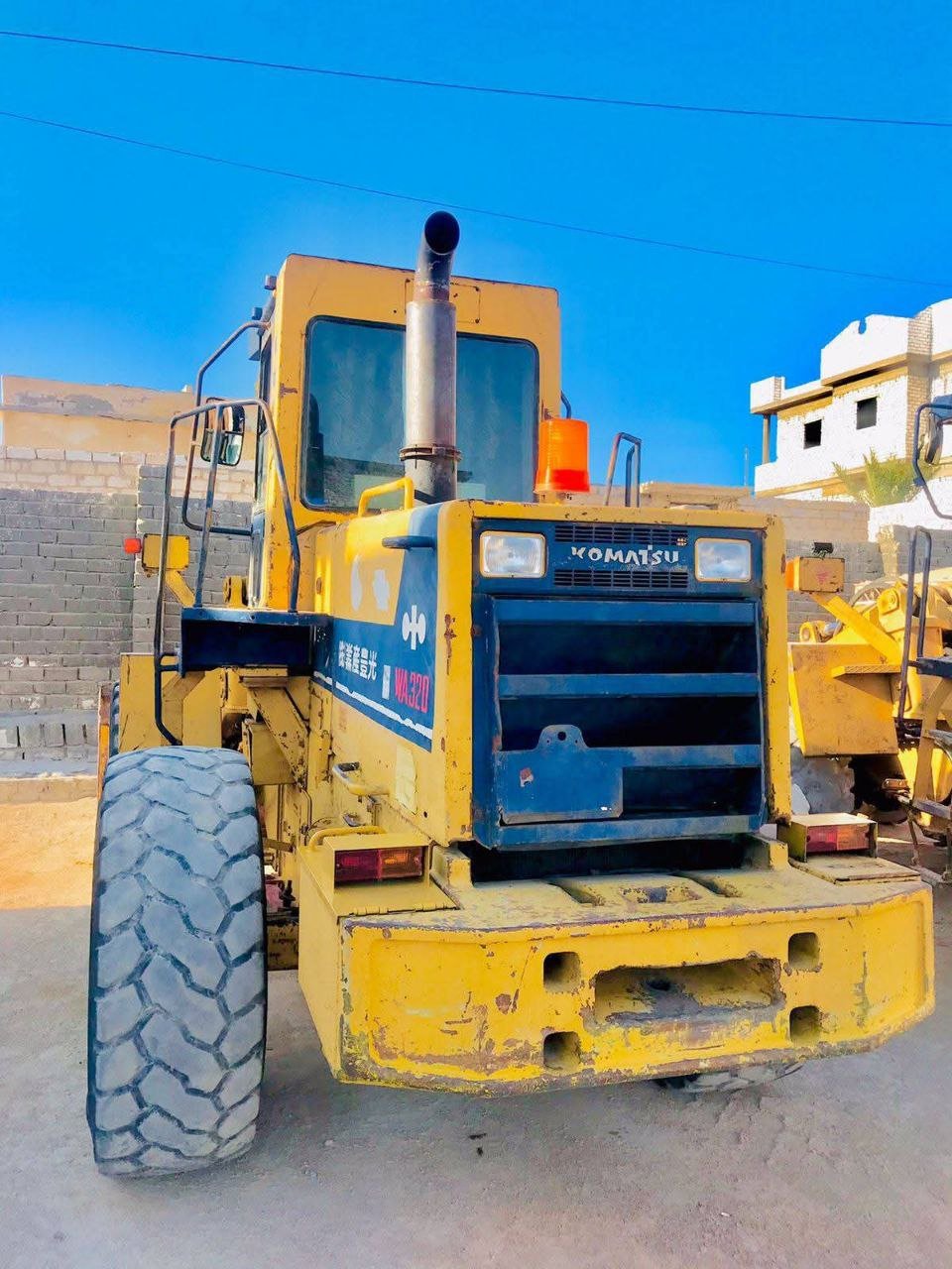 Komatsu loader for sale in Al Shorouk, Komatsu 320 model 1990 located in Al Shorouk, the best site for selling trucks and heavy equipment in Egypt