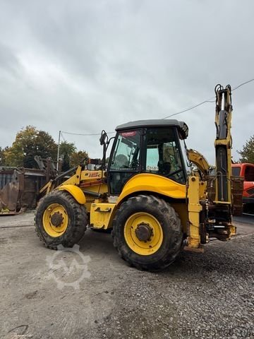 NEW HOLLAND loader for sale, NEW HOLLAND 115, 2012 model, imported from Europe. The best site for selling trucks and heavy equipment in Egypt.