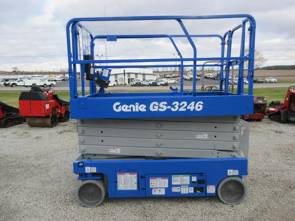 GENIE scissor lift for sale in Cairo, GENIE 3246s, 2014 model, located in Giza, the best site for selling trucks and heavy equipment in Egypt