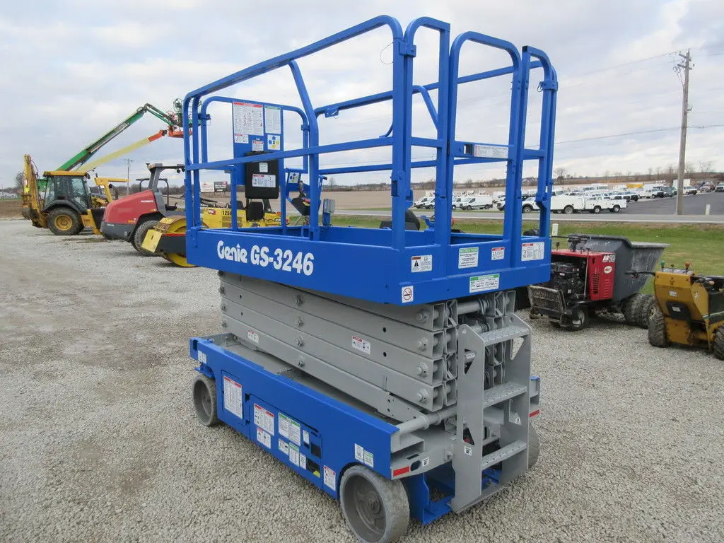GENIE scissor lift for sale in Cairo, GENIE 3246s, 2014 model, located in Giza, the best site for selling trucks and heavy equipment in Egypt